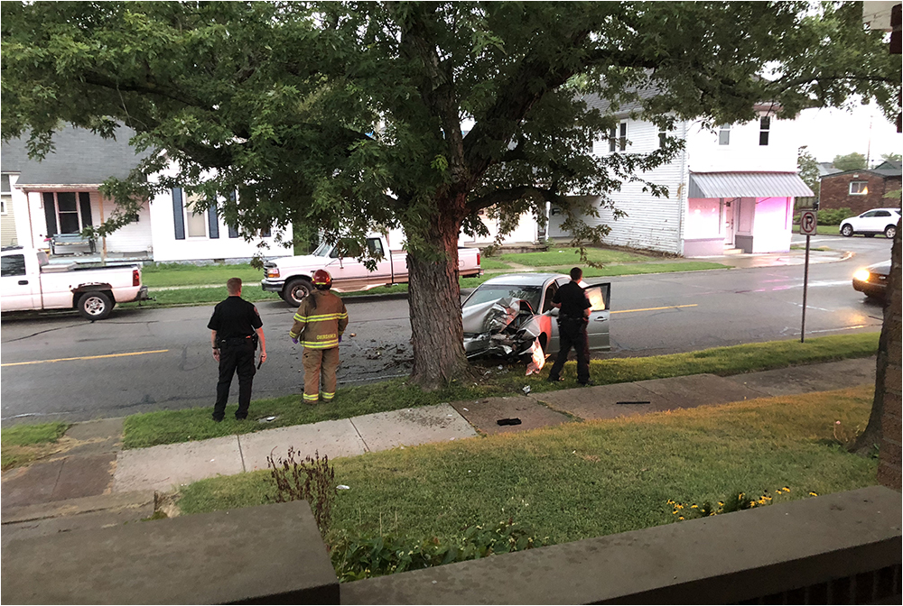 car hits tree at Ben's house