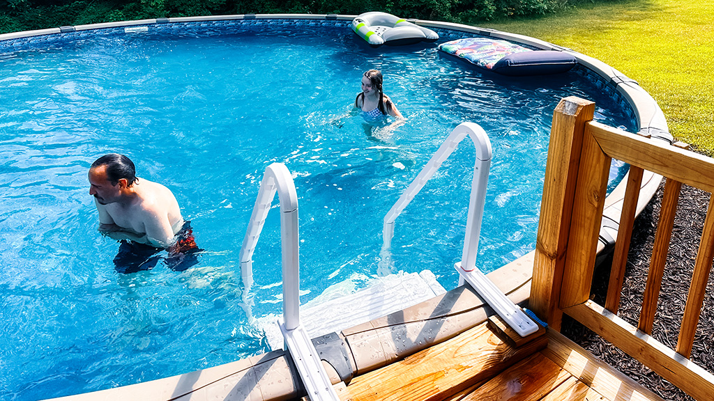 Ben and Coco in the pool