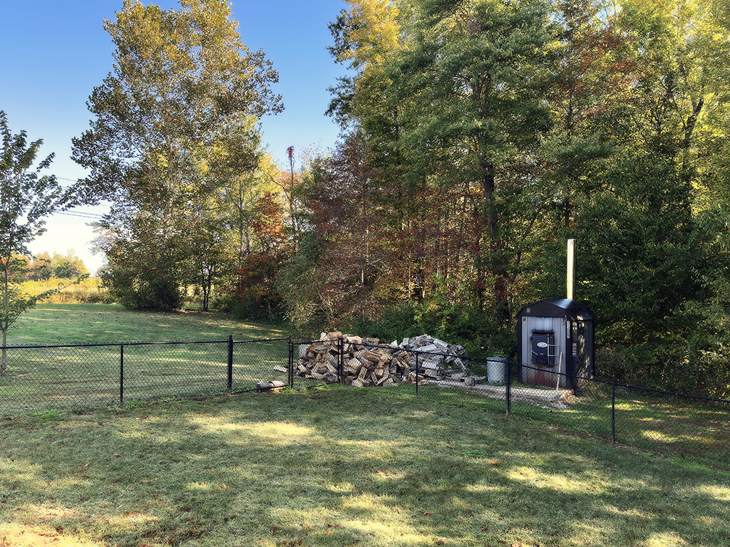wood pile by outside boiler