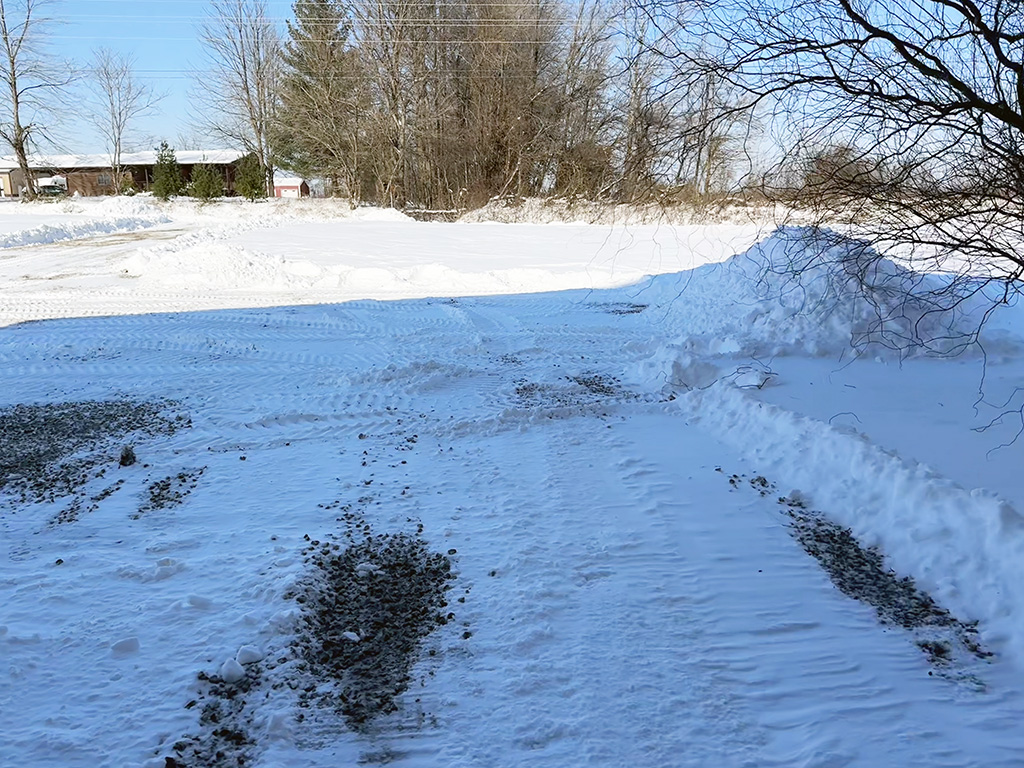 snow covered driveway in rural Indiana